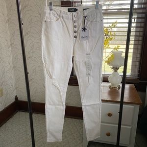 White distressed skinny jeans